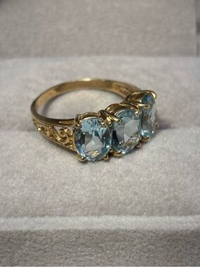14K Gold Ring with Triple Light Blue Topaz, size 7